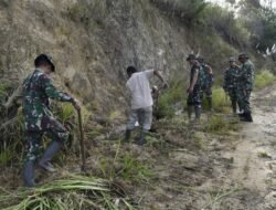 Satgas TMMD ke-126 Bersama Warga Bersihkan Jalan Sepanjang 1.750 Meter di Desa Reje Guru