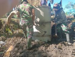 Gotong Royong Satgas TMMD dan Warga Tingkatkan Sanitasi Desa