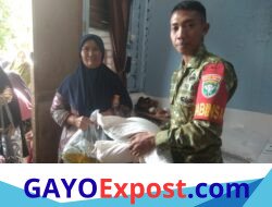 Babinsa Koramil 01/Lut Tawar Dampingi Penyaluran Bantuan Pangan untuk 88 Warga Toweren Uken